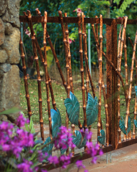 Custom metal bamboo-style tropical gate by Kipu Forge